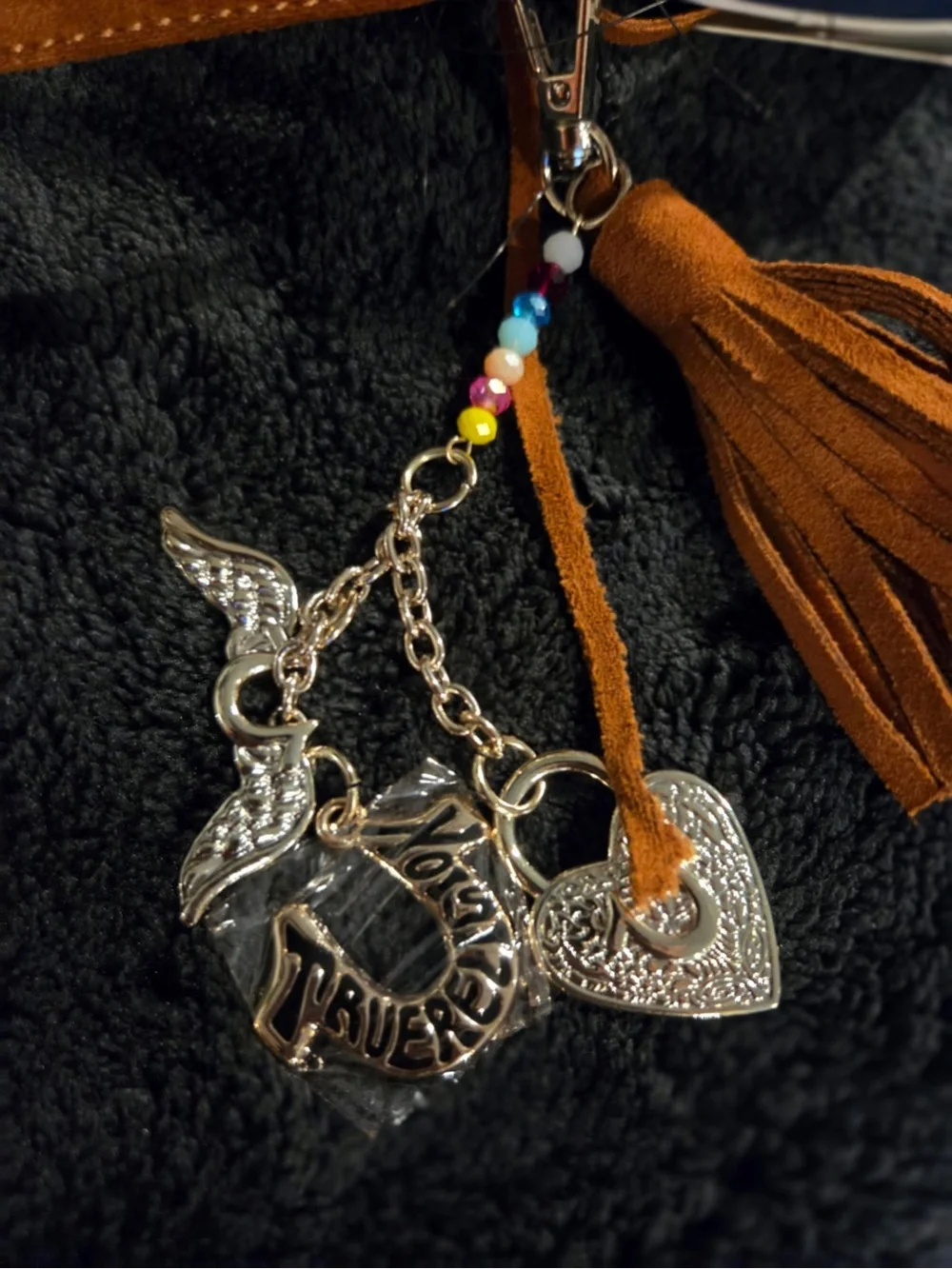 True Religion Faux suede fringe purse with silver studs and a heart charm